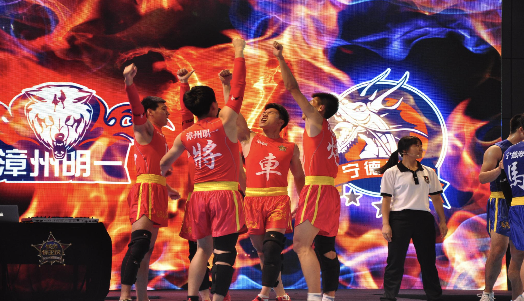 Jowdou teams entering an event arena
